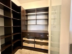 Custom Pantry Organization System with Adjustable shelving, drawers, roll outs and countertop space